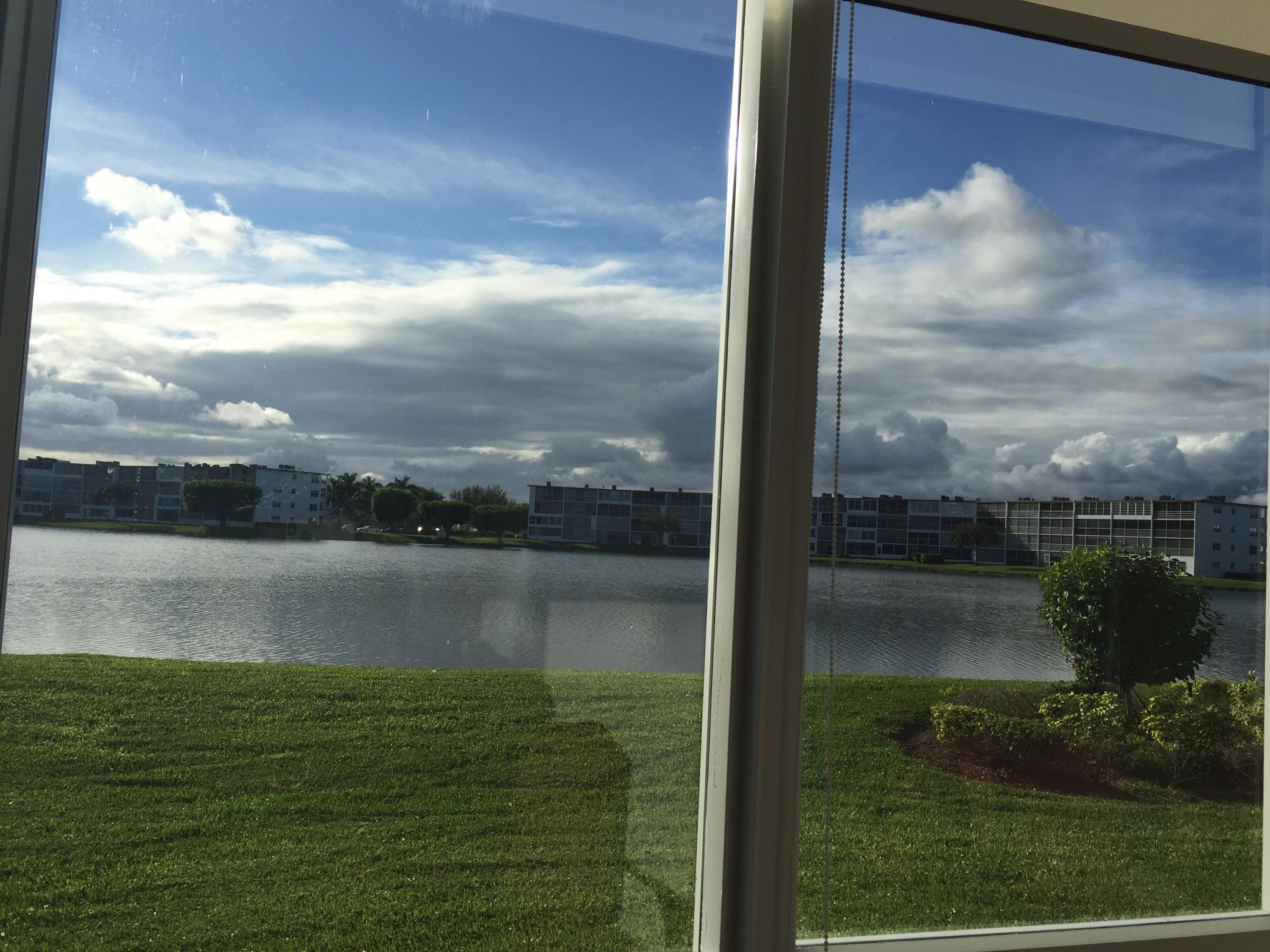 1072 Exeter Boca Raton, FL 33434 - Photo 31 of 32 LAKE VIEW FROM PATIO