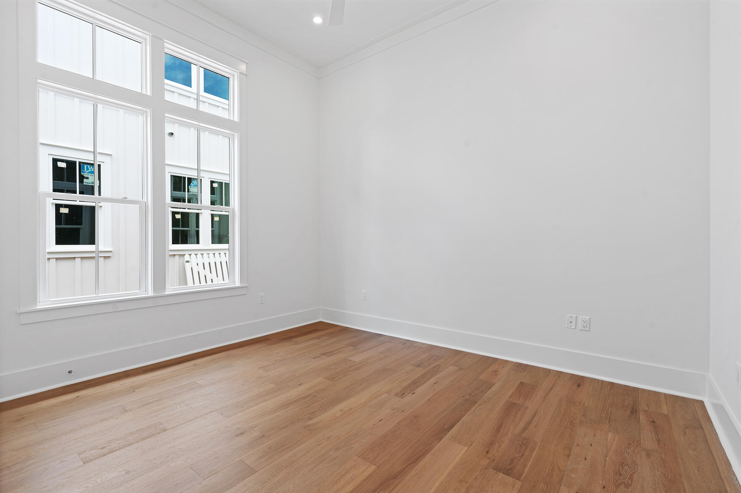 129 Pollard Cove West, Unit LOT 58 Watersound, FL 32461 - Photo 14 of 39 an empty room with a window