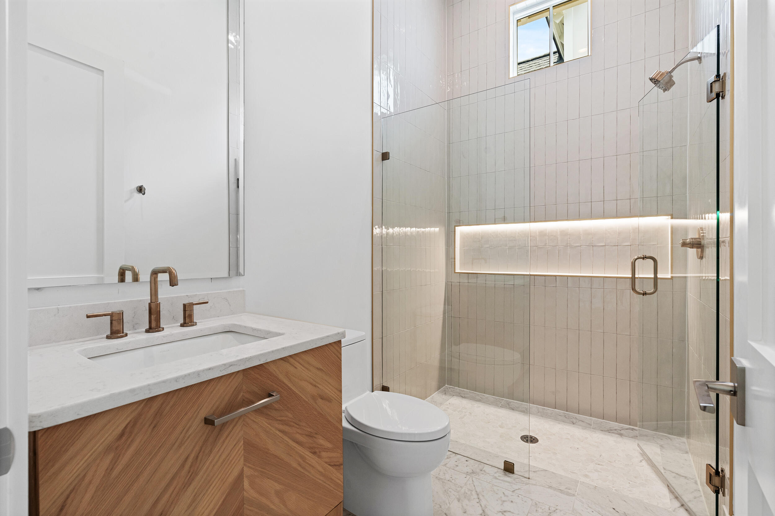 129 Pollard Cove West, Unit LOT 58 Watersound, FL 32461 - Photo 15 of 39 a bathroom with a sink toilet and shower