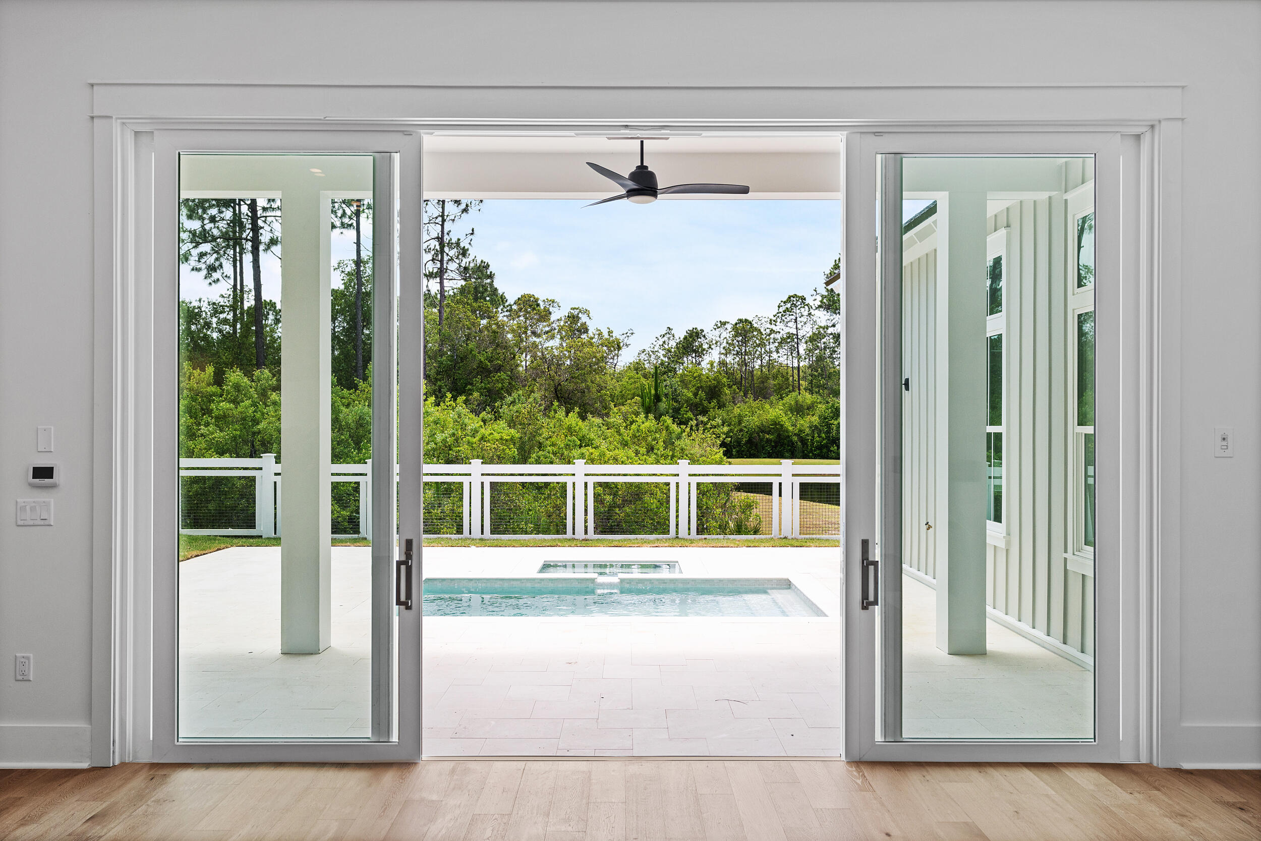 129 Pollard Cove West, Unit LOT 58 Watersound, FL 32461 - Photo 8 of 39 a view of a living room washer and dryer