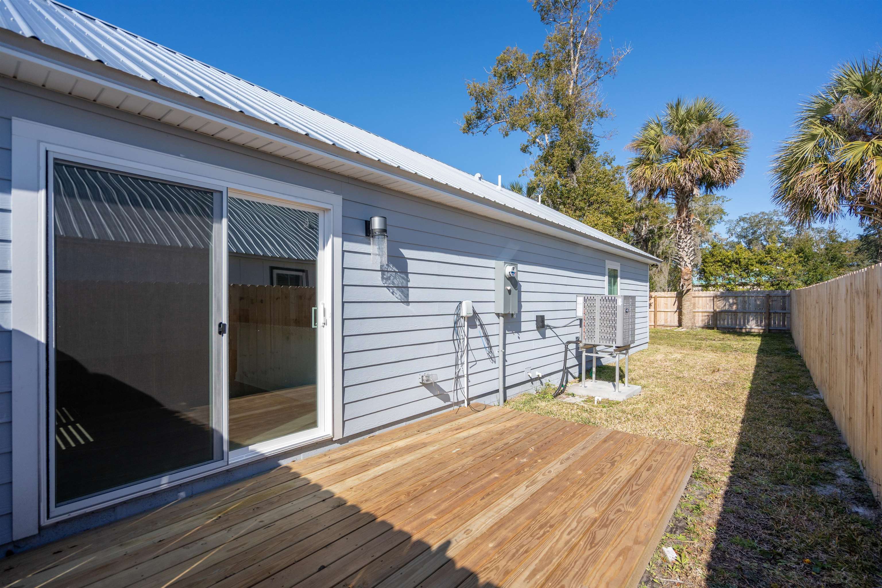 79 Helen Street St. Augustine, FL 32084 - Photo 26 of 33 a backyard of a house