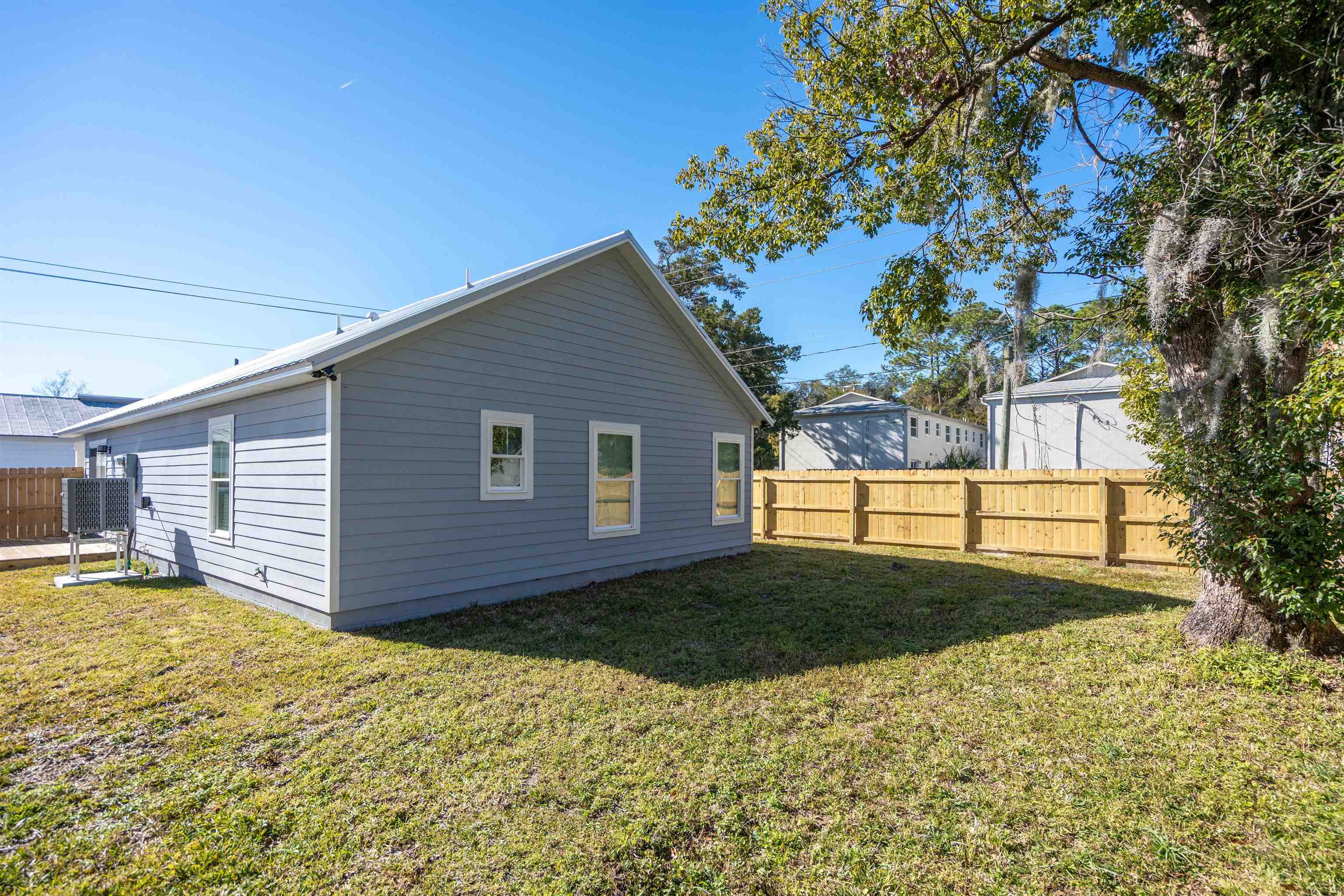 79 Helen Street St. Augustine, FL 32084 - Photo 28 of 33 a view of a backyard of the house