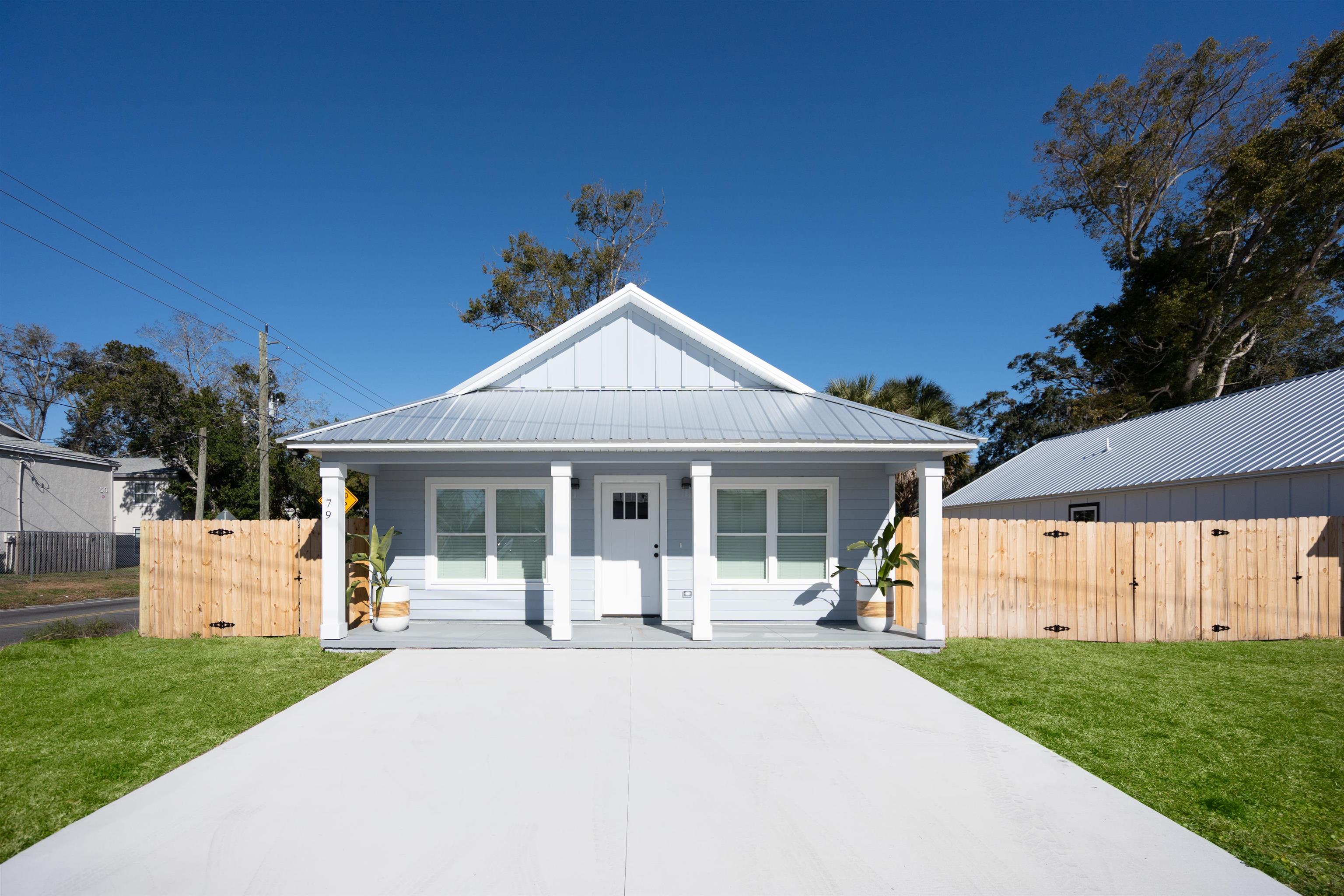 79 Helen Street St. Augustine, FL 32084 - Photo 3 of 33 a view of a house with a backyard