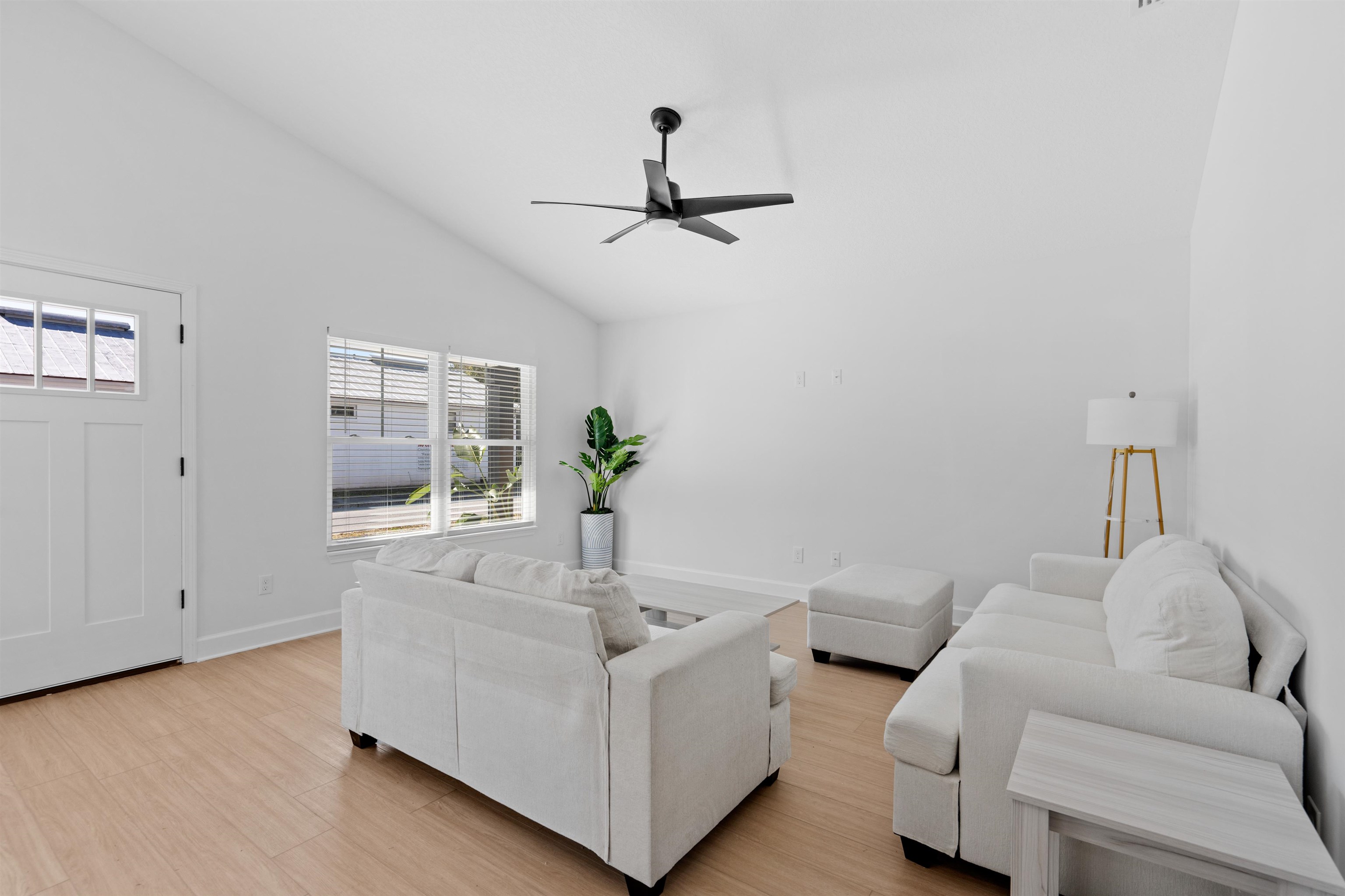 79 Helen Street St. Augustine, FL 32084 - Photo 8 of 33 a living room with furniture and a ceiling fan