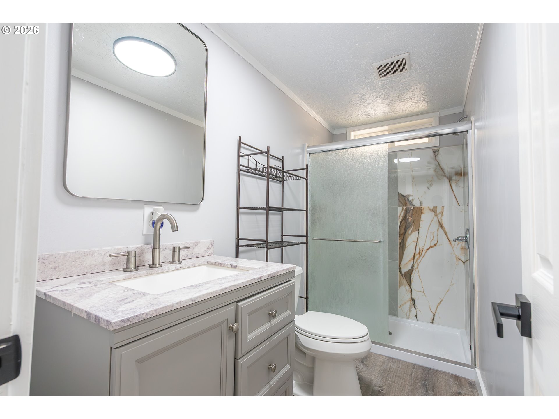 3554 Turner Road Southeast Salem, OR 97302 - Photo 12 of 20 a bathroom with a sink toilet and shower