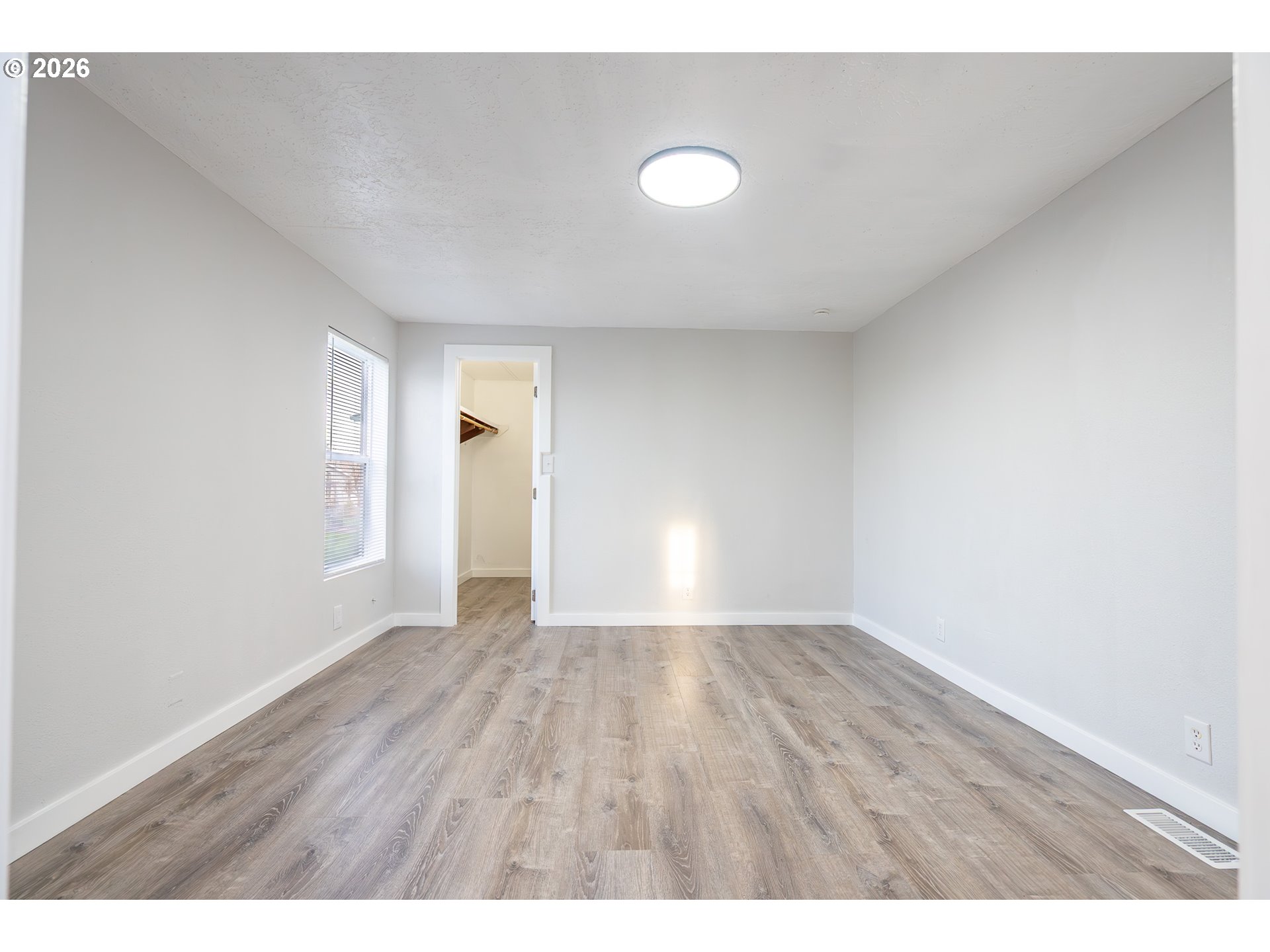 3554 Turner Road Southeast Salem, OR 97302 - Photo 14 of 20 a view of an empty room and wooden floor