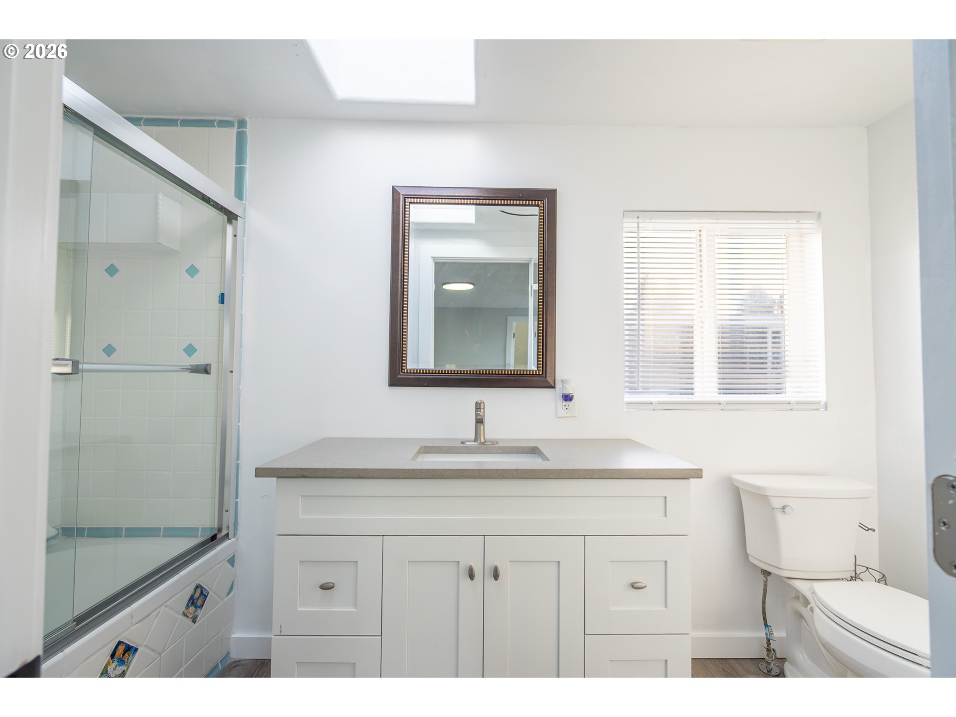 3554 Turner Road Southeast Salem, OR 97302 - Photo 15 of 20 a bathroom with a sink and a mirror