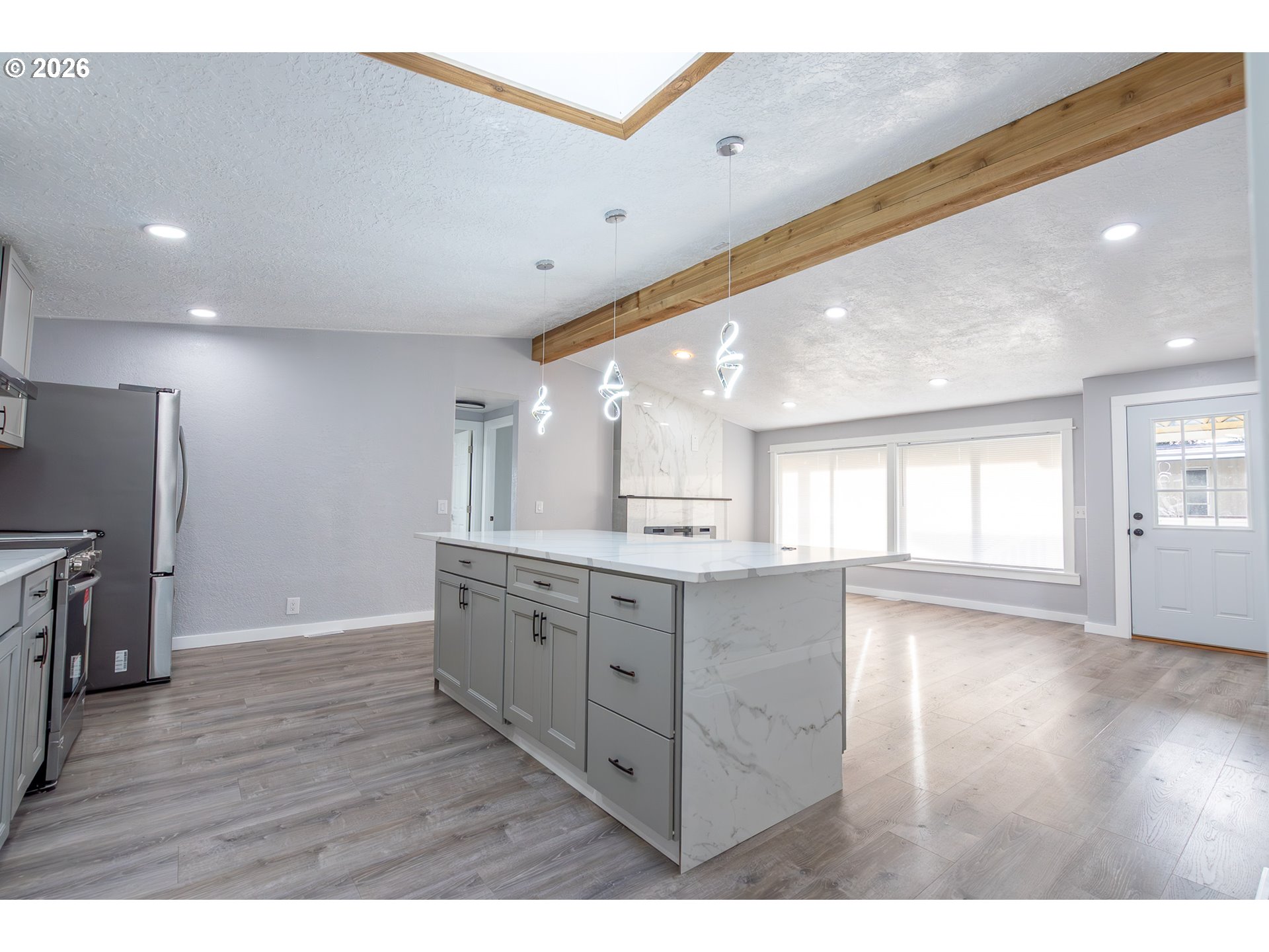3554 Turner Road Southeast Salem, OR 97302 - Photo 8 of 20 a kitchen with granite countertop a stove a sink and a refrigerator