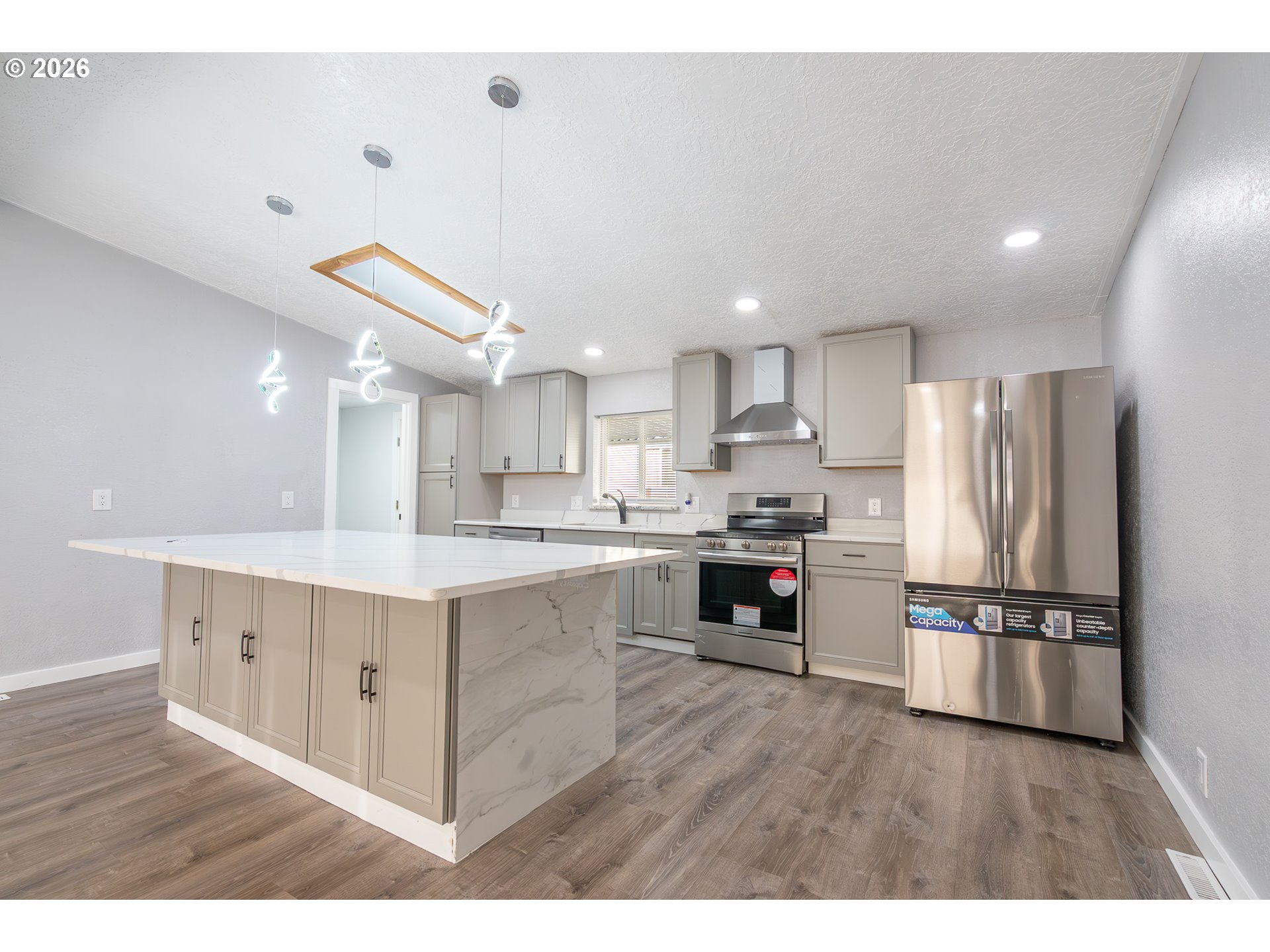 3554 Turner Road Southeast Salem, OR 97302 - Photo 9 of 20 a kitchen with a refrigerator and a sink