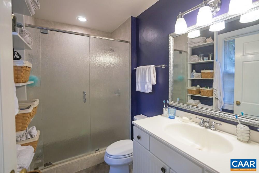 2040 Thomson Road Charlottesville, VA 22903 - Photo 13 of 23 a bathroom with a sink a toilet and shower