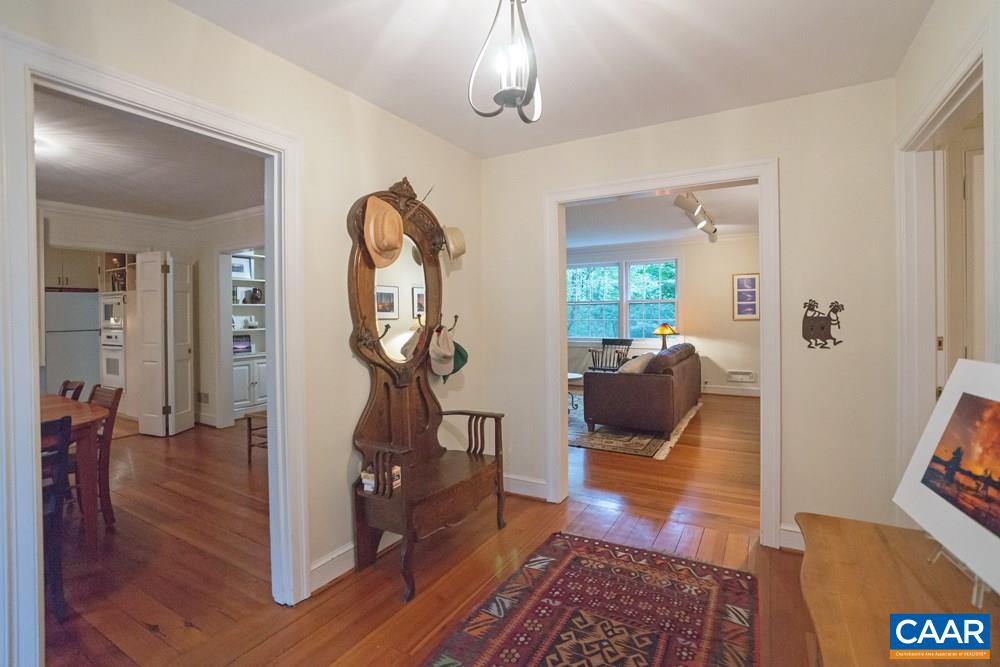 2040 Thomson Road Charlottesville, VA 22903 - Photo 2 of 23 a view of a livingroom with furniture and hardwood floor