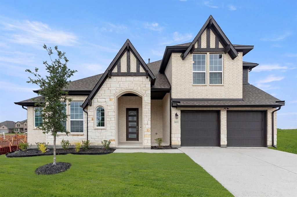 1013 Butterfly Lane Justin, TX 76247 - Photo 1 of 34 1013-butterfly-ln-justin-tx-front-exterior
