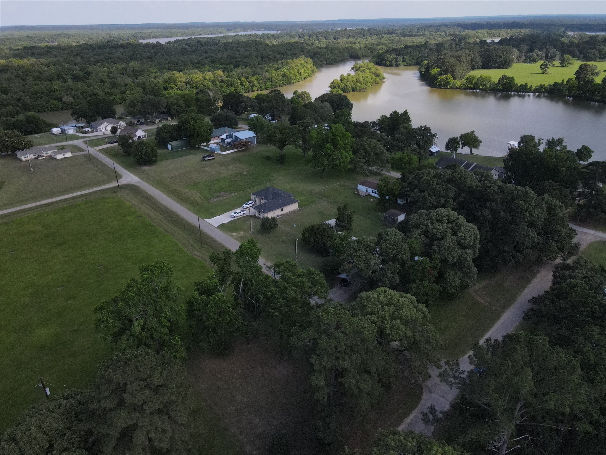 Lot 3 Hermitage Street Trinity, TX 75862 - Photo 8 of 8 an aerial view of residential houses with outdoor space and lake view
