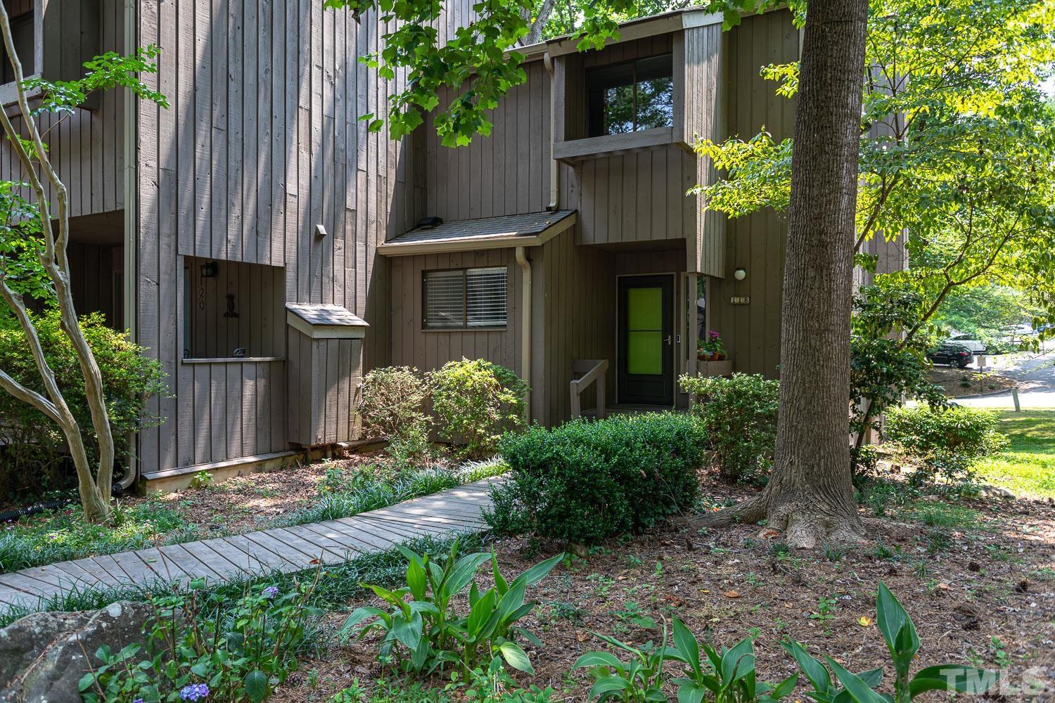 118 Ridge Trail Chapel Hill, NC 27516 - Photo 24 of 31 a front view of a house with a yard