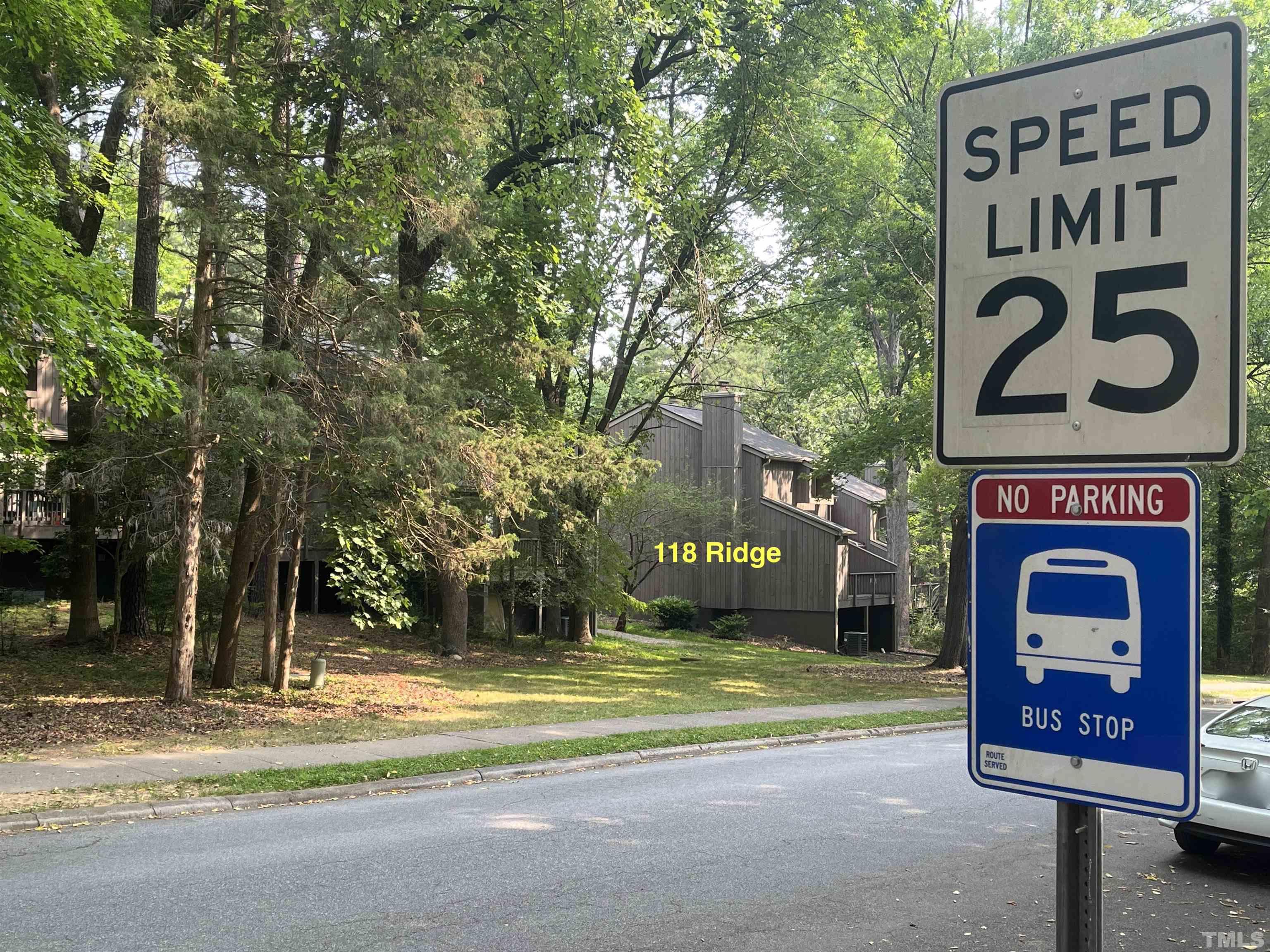 118 Ridge Trail Chapel Hill, NC 27516 - Photo 29 of 31 a sign that is on a pole on a street