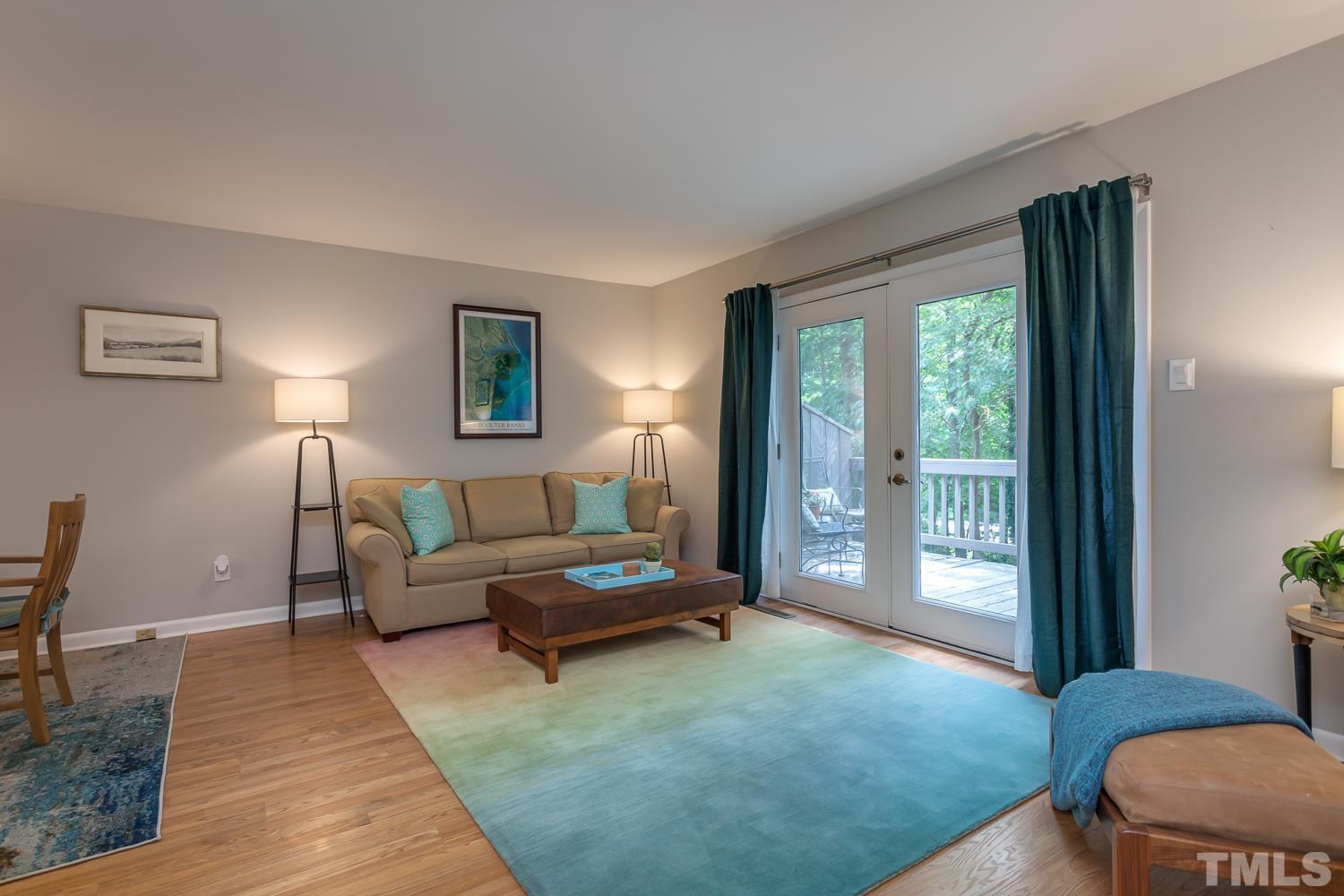 118 Ridge Trail Chapel Hill, NC 27516 - Photo 4 of 31 a living room with furniture and a rug