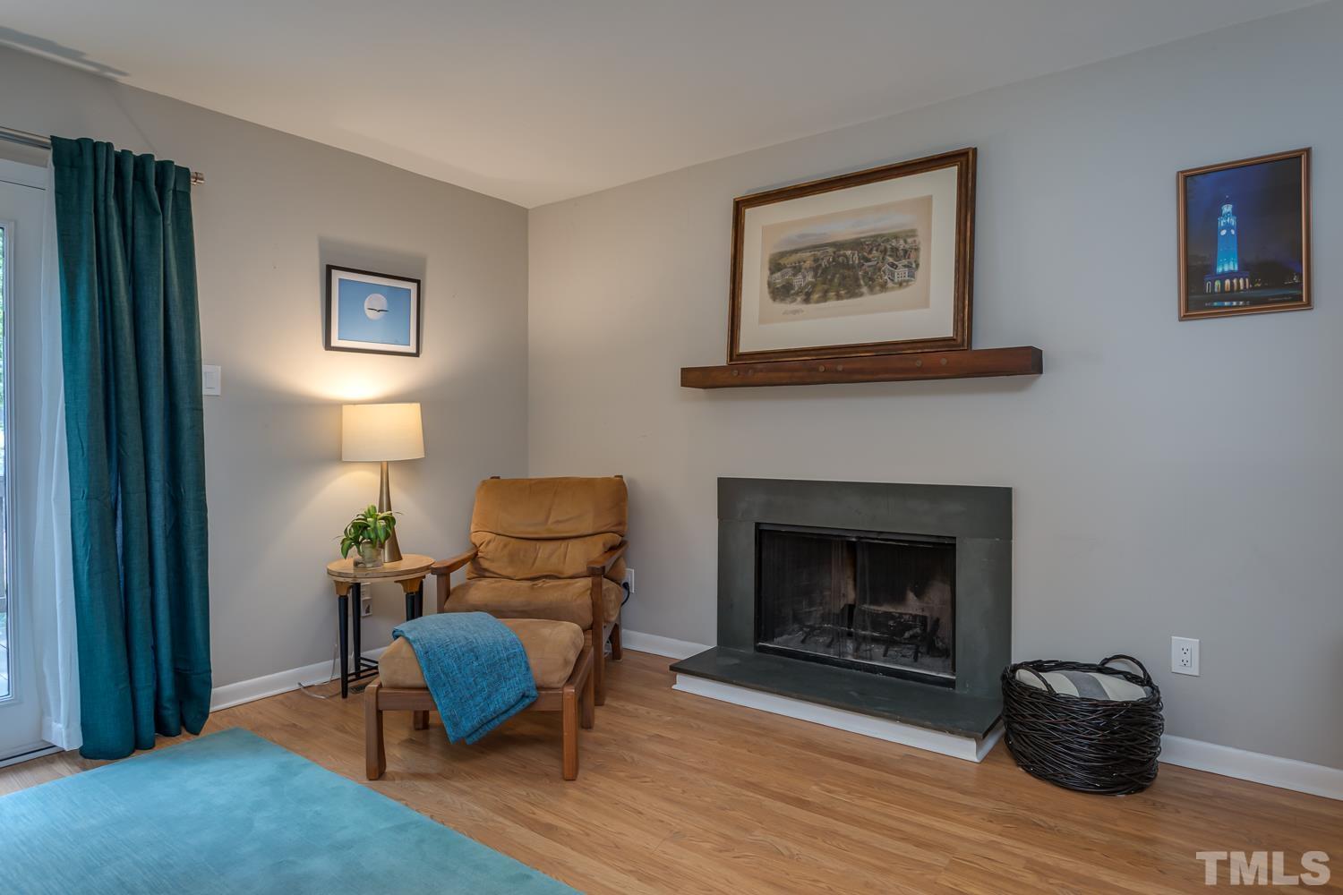 118 Ridge Trail Chapel Hill, NC 27516 - Photo 5 of 31 a living room with furniture and a fireplace