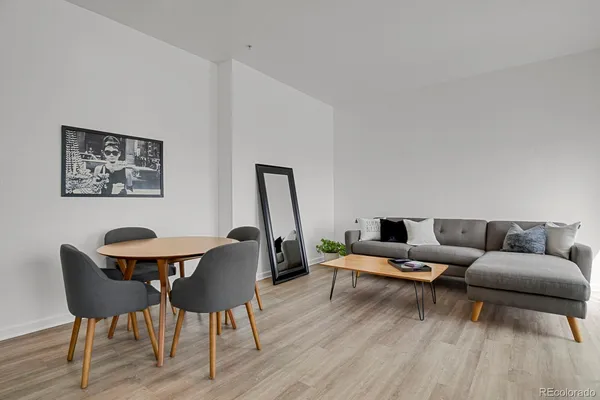 a kitchen with stainless steel appliances a refrigerator sink and microwave