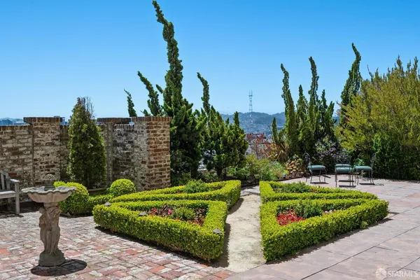 a view of a swimming pool with a lounge chairs