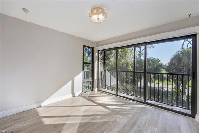 a view of a room with wooden floor and iron floor