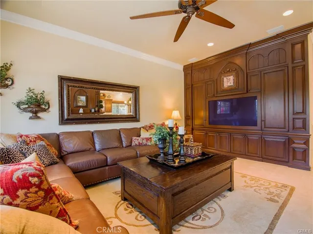 a bedroom with a large bed and a dresser