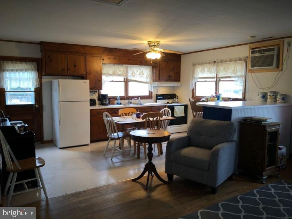 21606 Chicken Point Road Tilghman, MD 21671 - Photo 38 of 53 Cottage Kitchen & living space