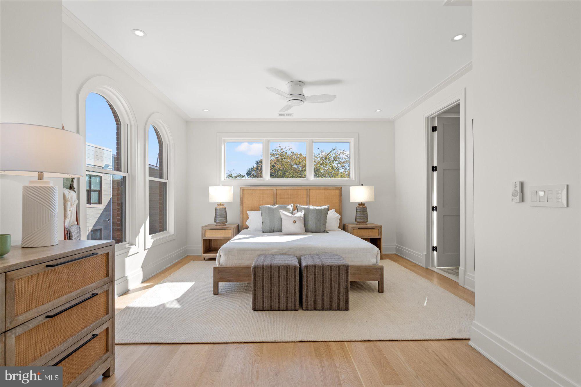 107 North West Alexandria, VA 22314 - Photo 32 of 65 a bedroom with a large bed and a dresser