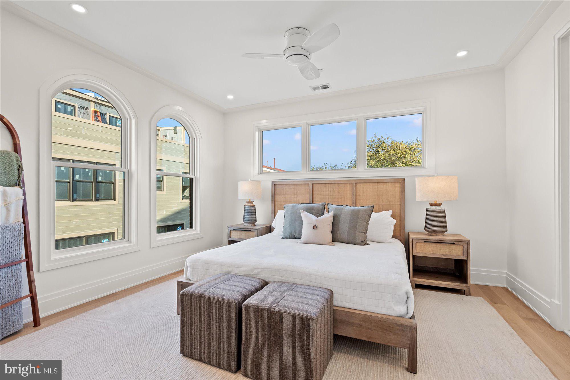 107 North West Alexandria, VA 22314 - Photo 33 of 65 a bedroom with a large bed and a window