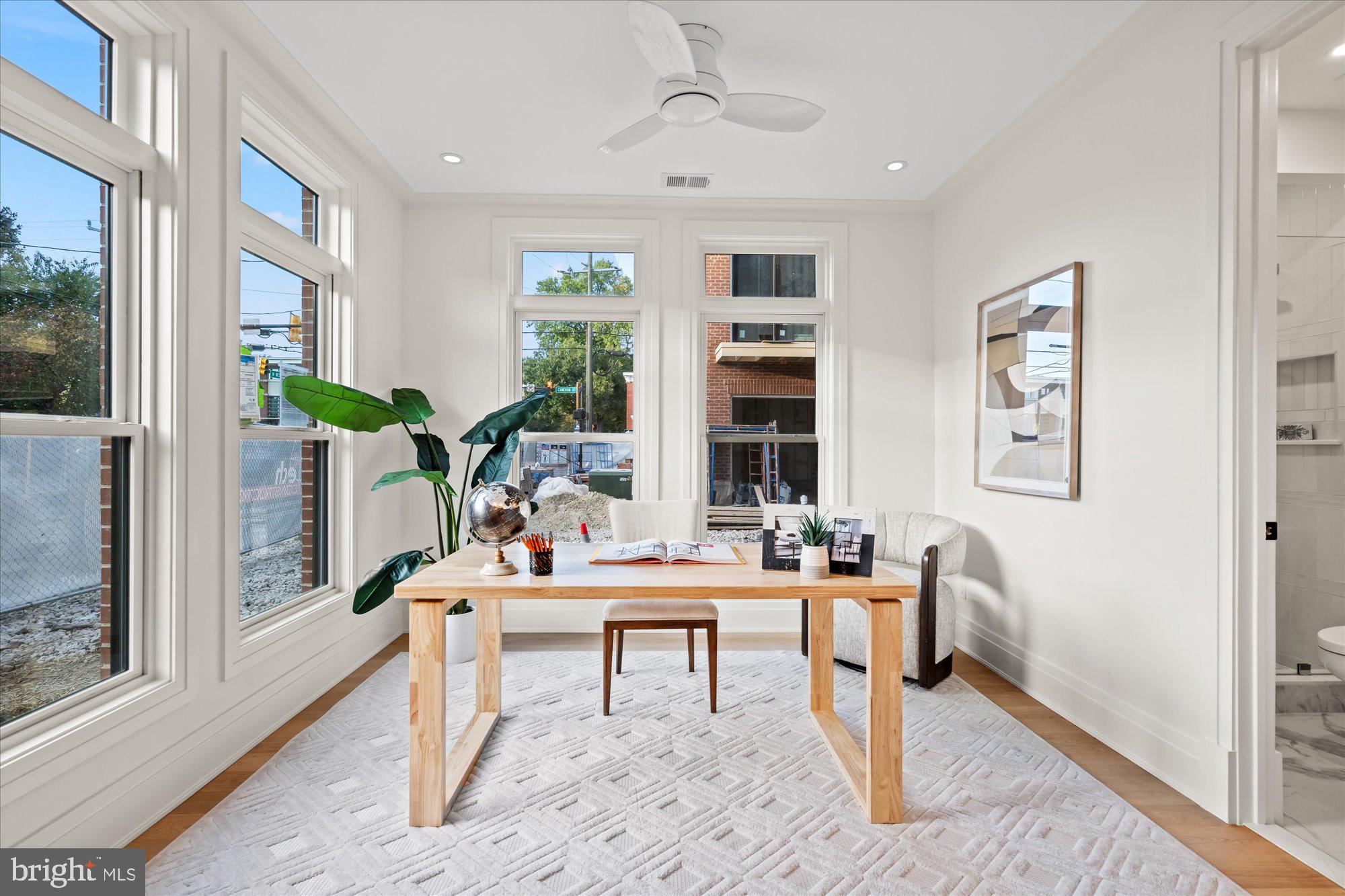 107 North West Alexandria, VA 22314 - Photo 4 of 65 a work room with furniture and windows