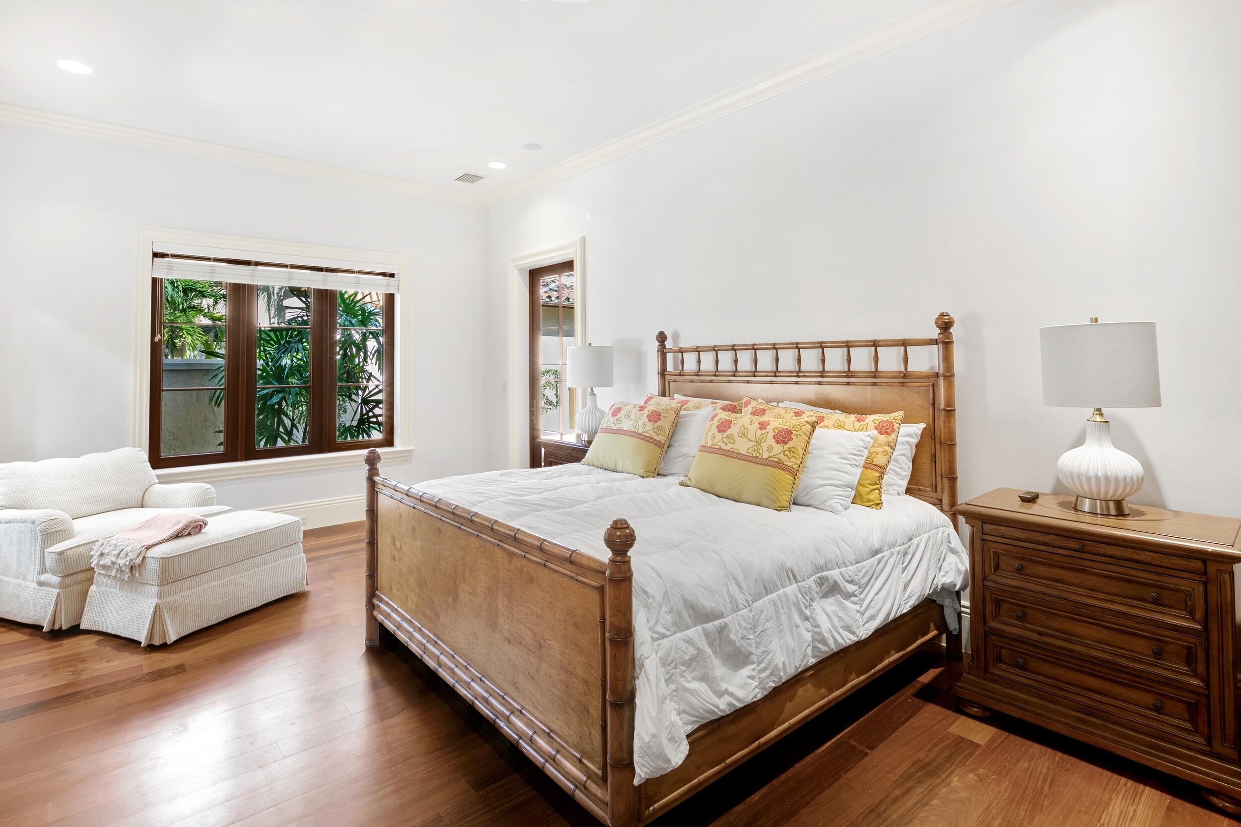 306 Villa Drive Jupiter, FL 33477 - Photo 11 of 30 a bedroom with a bed and window