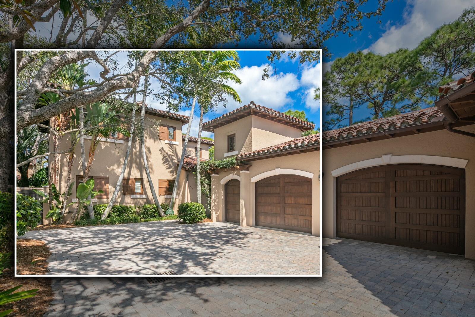 306 Villa Drive Jupiter, FL 33477 - Photo 26 of 30 a front view of a house with garage
