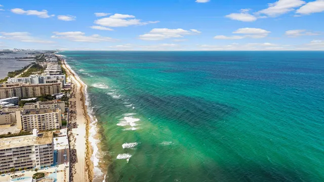 a view of a city with tall buildings