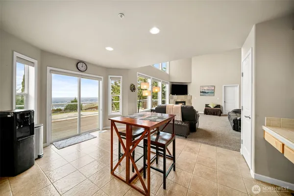 a view of a dining area with furniture window and outside view