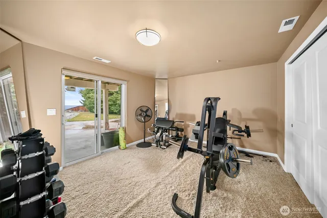 a view of a room with gym equipment