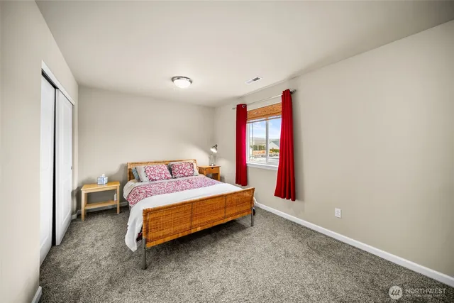 a kitchen with a stove and a sink
