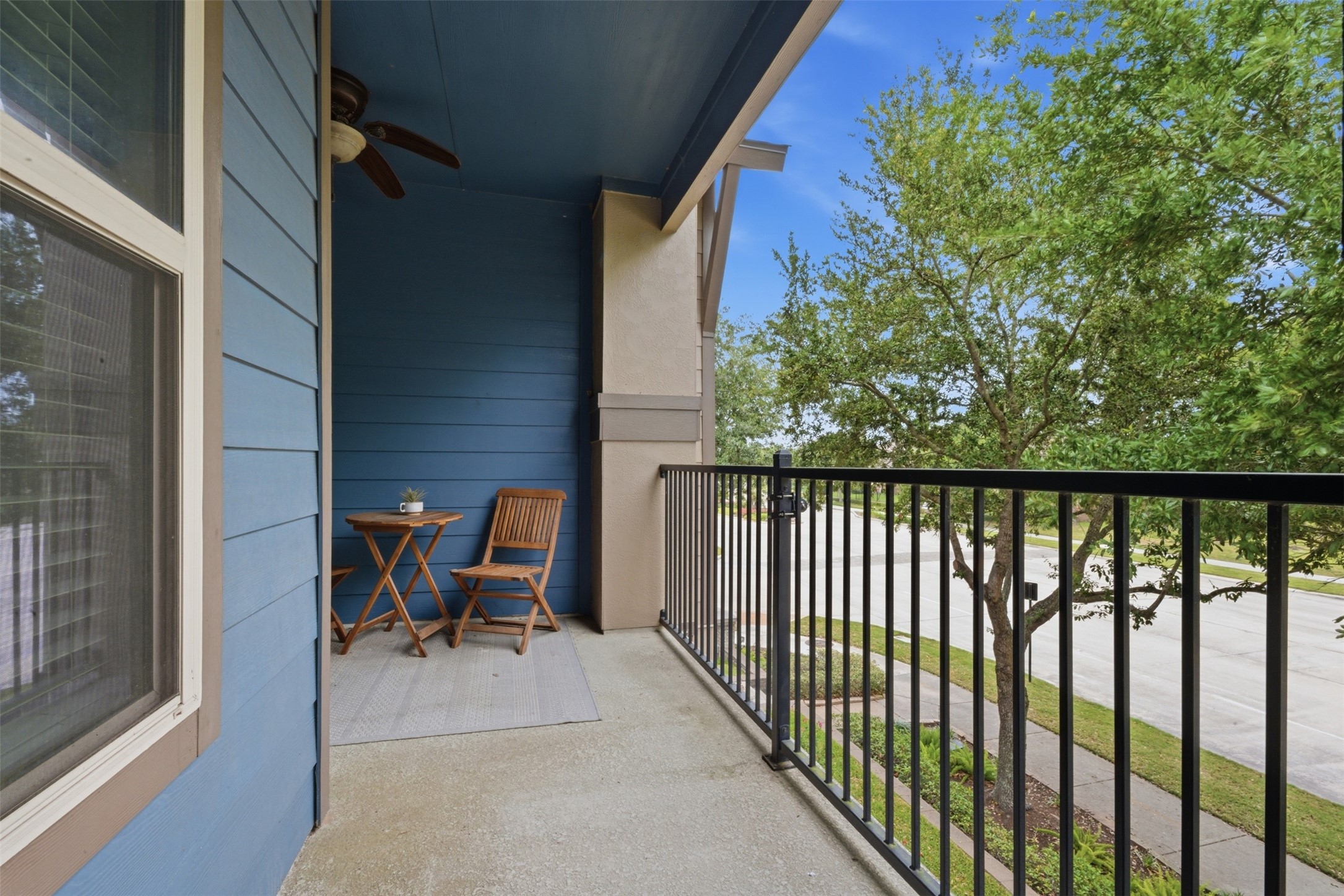 706 Water Street Webster, TX 77598 - Photo 15 of 23 Lots of space in primary suite balcony. Beautiful view of palm trees. Breezy and good for the soul!