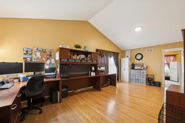 a room with furniture and a flat screen tv