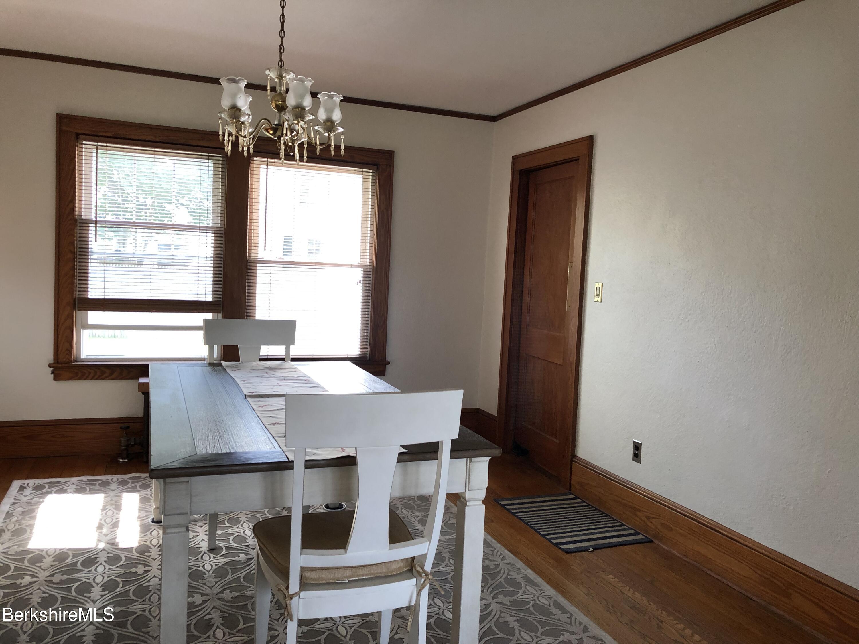 9 Weston Street Pittsfield, MA 01201 - Photo 12 of 45 a view of a dining room with furniture and window