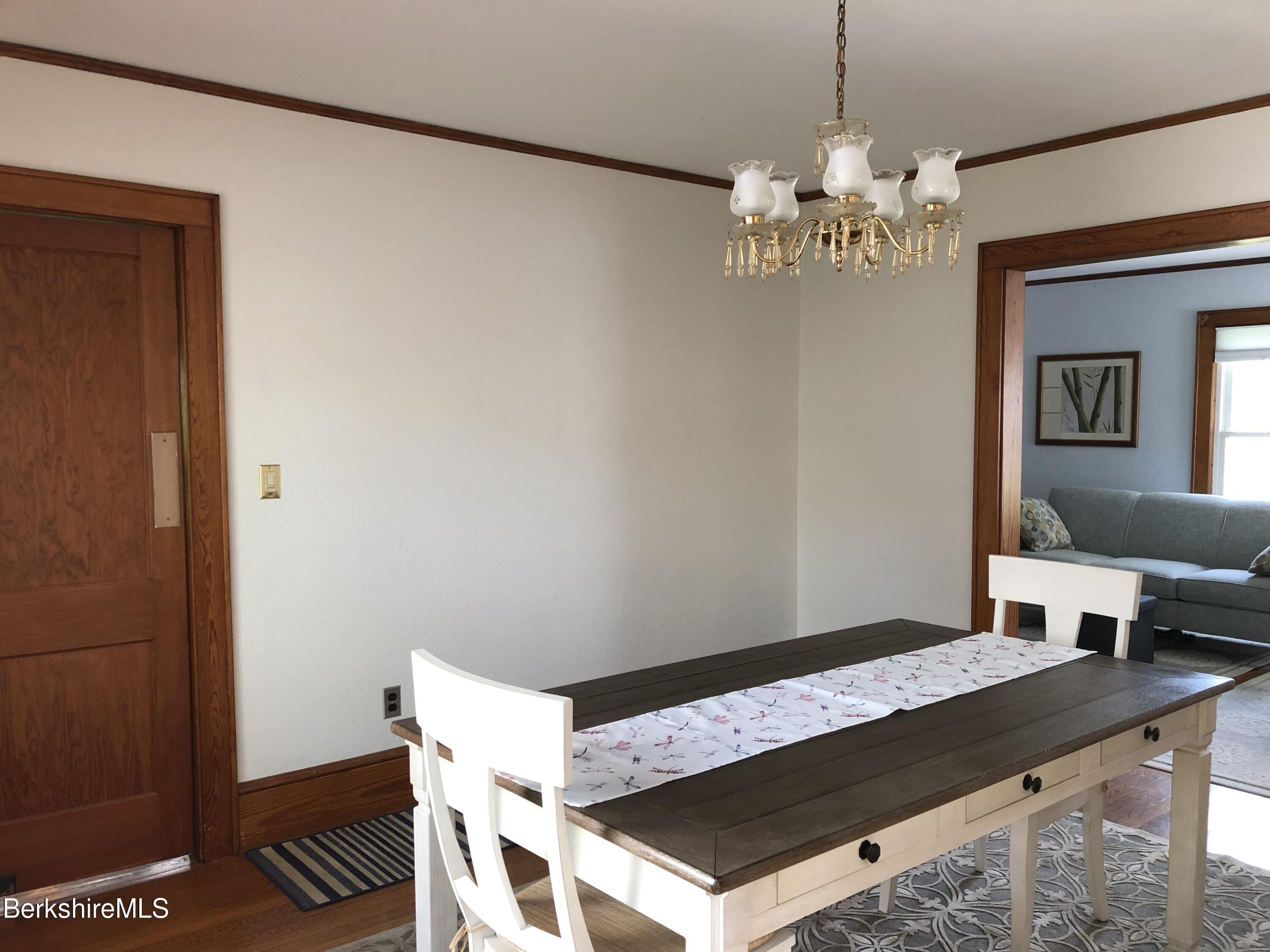 9 Weston Street Pittsfield, MA 01201 - Photo 13 of 45 a view of a room with a table and chairs