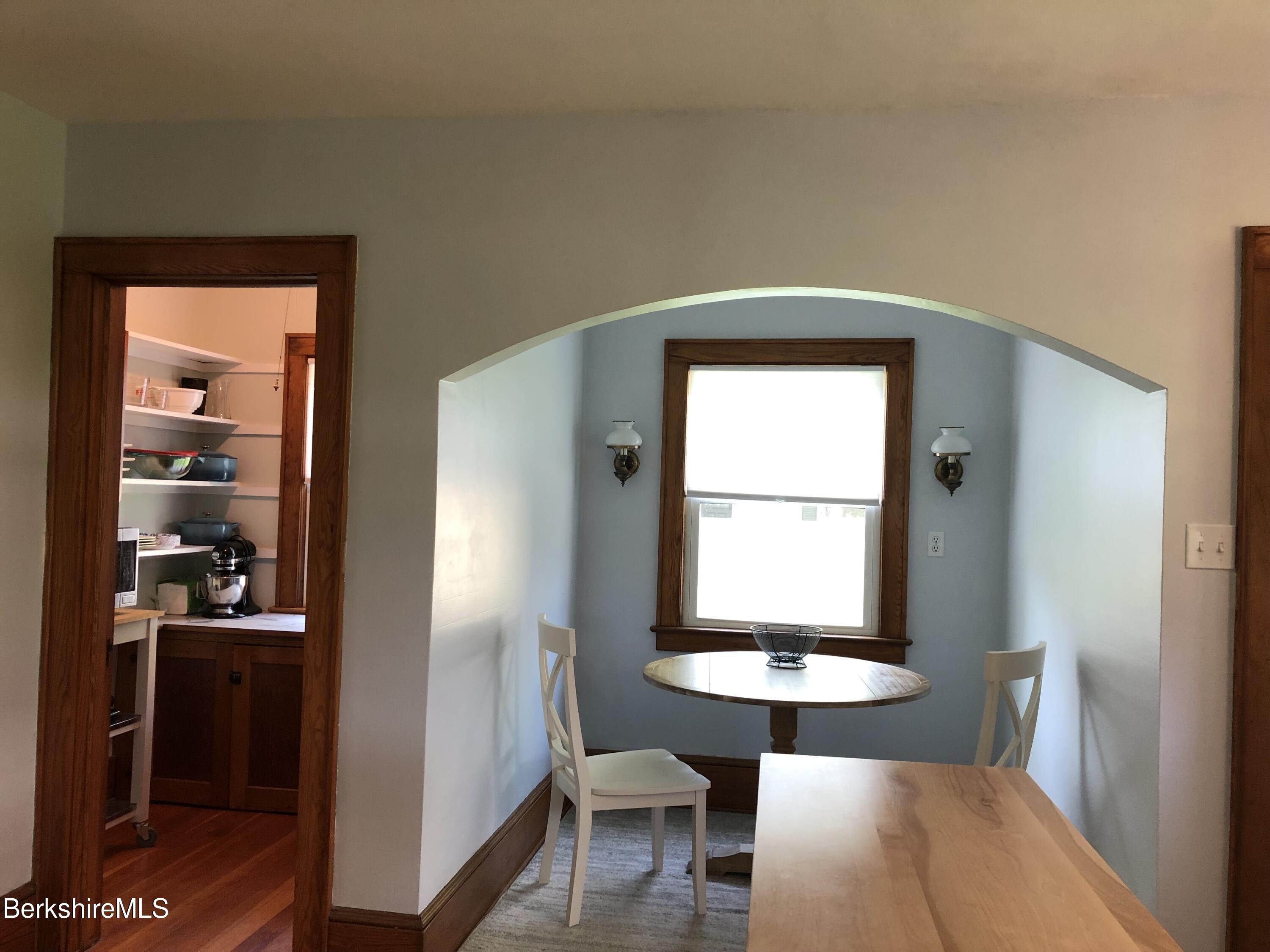 9 Weston Street Pittsfield, MA 01201 - Photo 16 of 45 a bedroom with a bed and a window