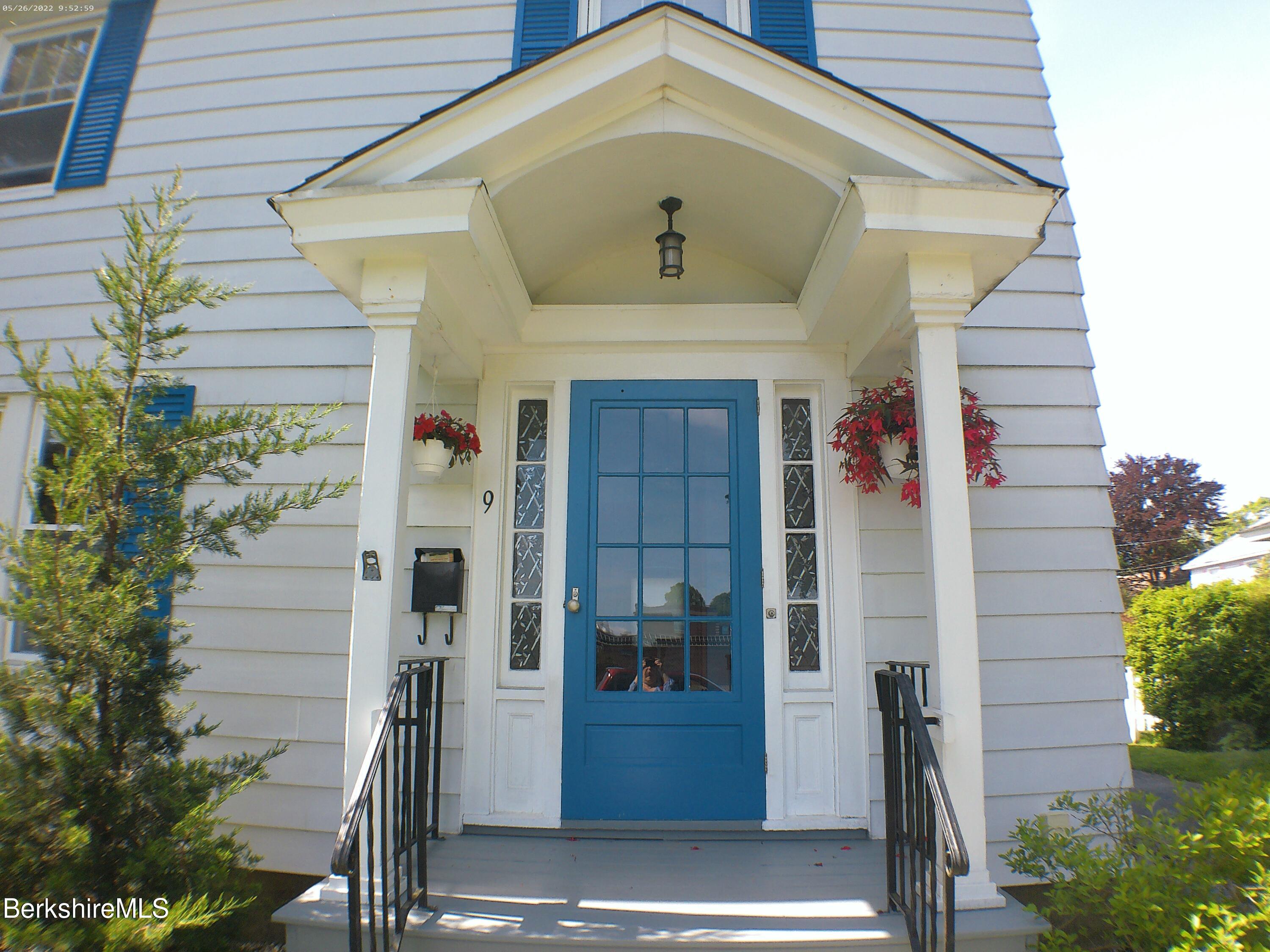 9 Weston Street Pittsfield, MA 01201 - Photo 2 of 45 a front view of a house with a garage