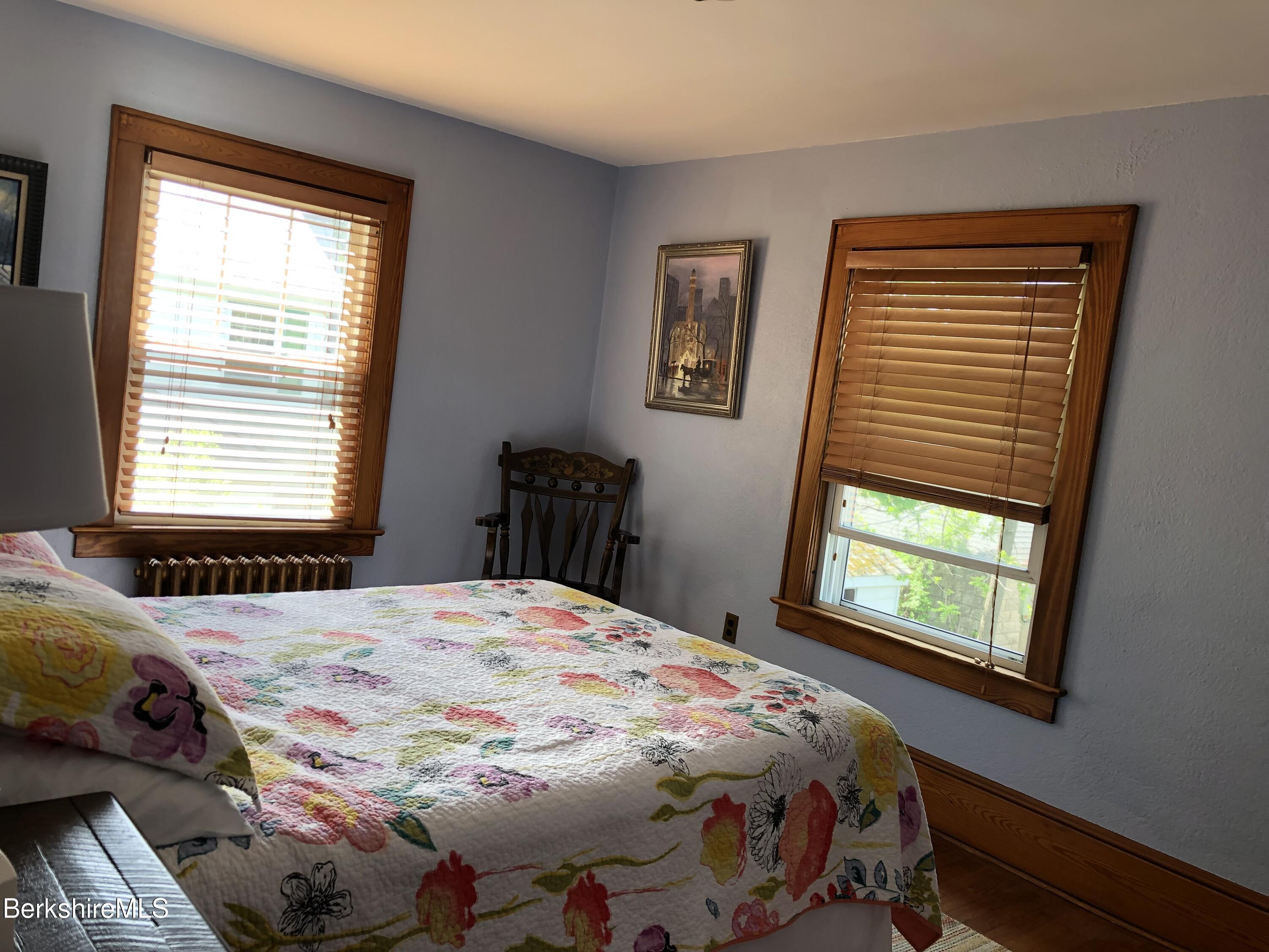 9 Weston Street Pittsfield, MA 01201 - Photo 29 of 45 a bedroom with a bed and a window