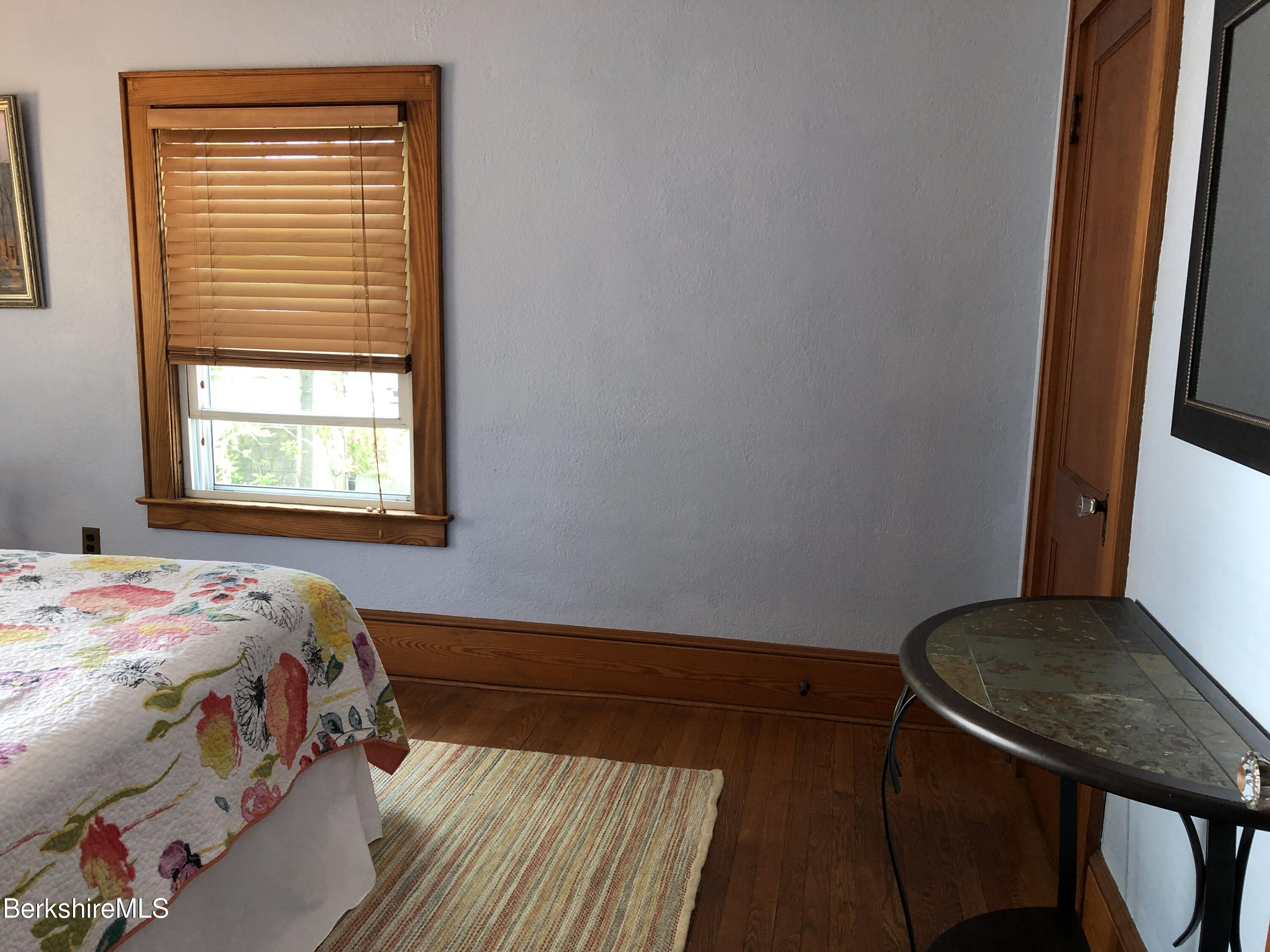 9 Weston Street Pittsfield, MA 01201 - Photo 30 of 45 a bedroom with a bed and a window