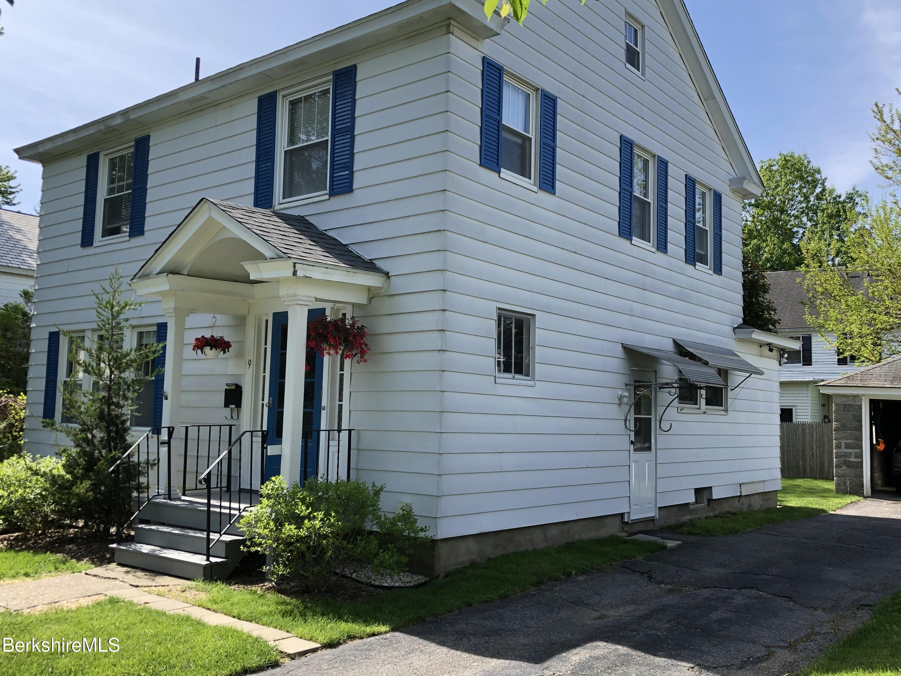 9 Weston Street Pittsfield, MA 01201 - Photo 3 of 45 a front view of a house with garden