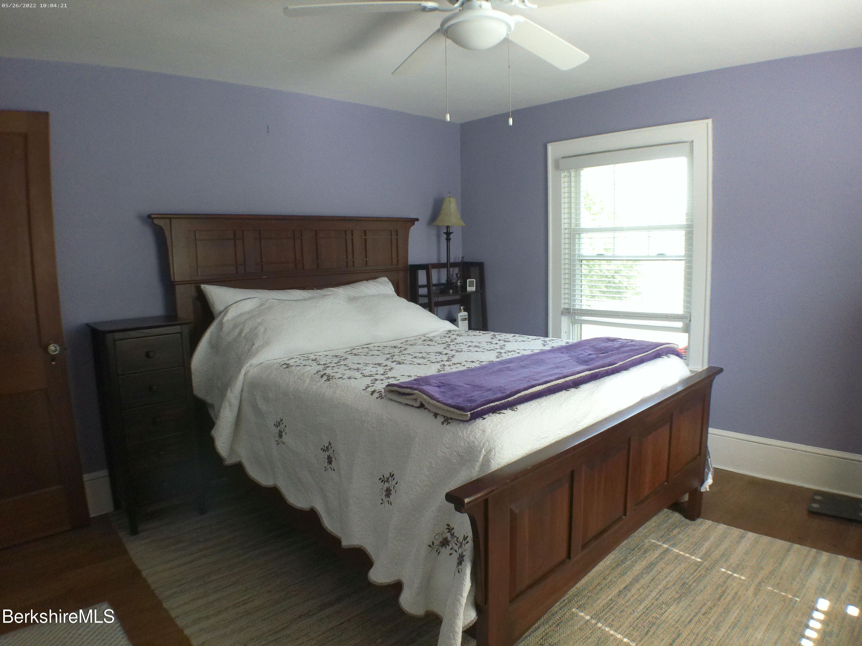 9 Weston Street Pittsfield, MA 01201 - Photo 33 of 45 a bedroom with a bed and window