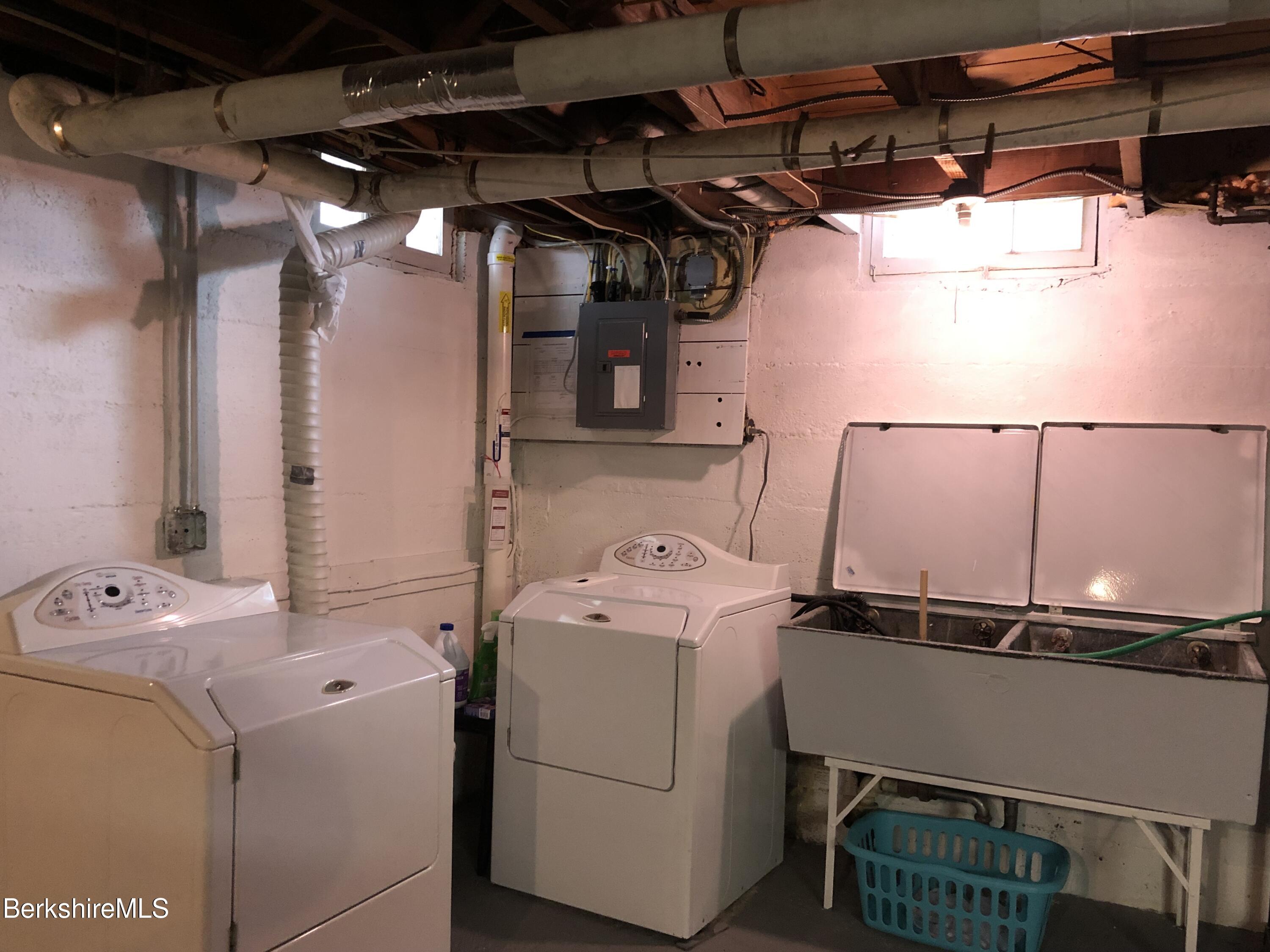 9 Weston Street Pittsfield, MA 01201 - Photo 36 of 45 a utility room with dryer and washer