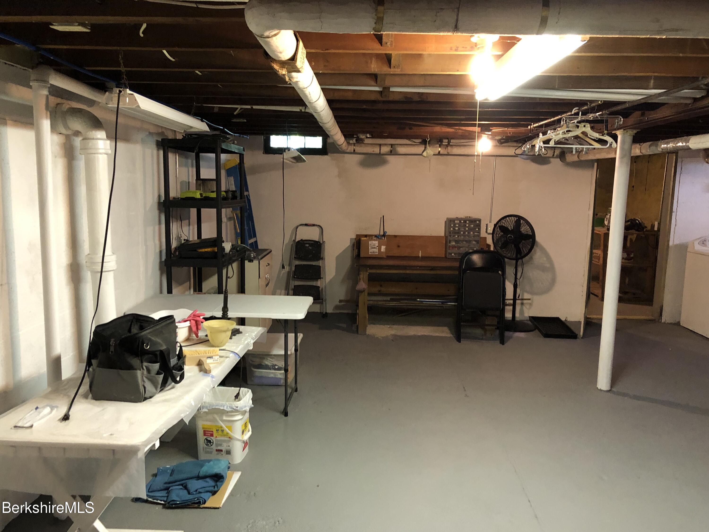 9 Weston Street Pittsfield, MA 01201 - Photo 41 of 45 a work room with furniture and a window
