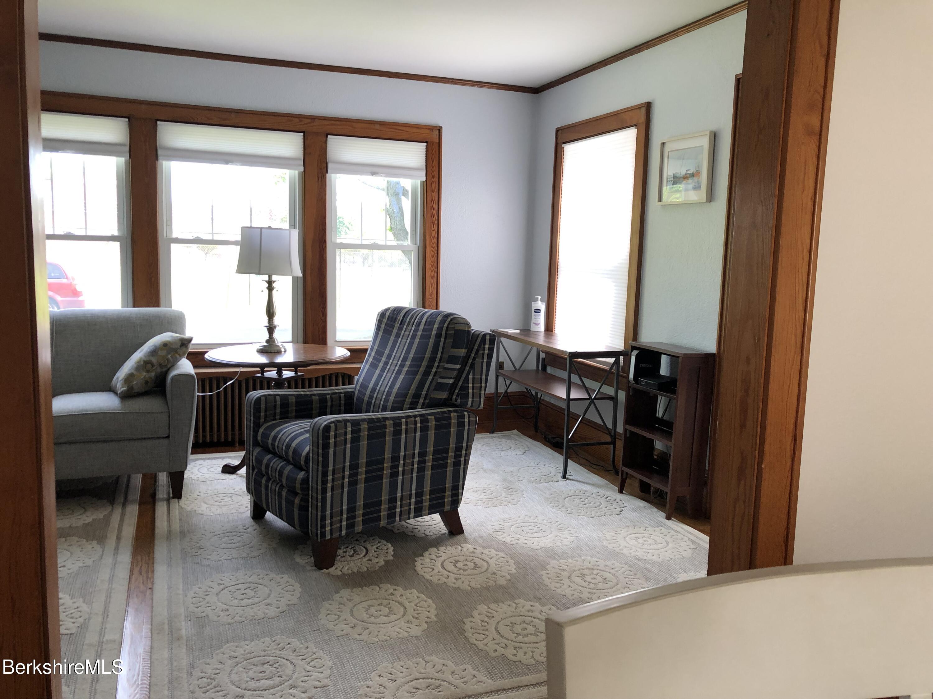 9 Weston Street Pittsfield, MA 01201 - Photo 10 of 45 a living room with furniture and a large window