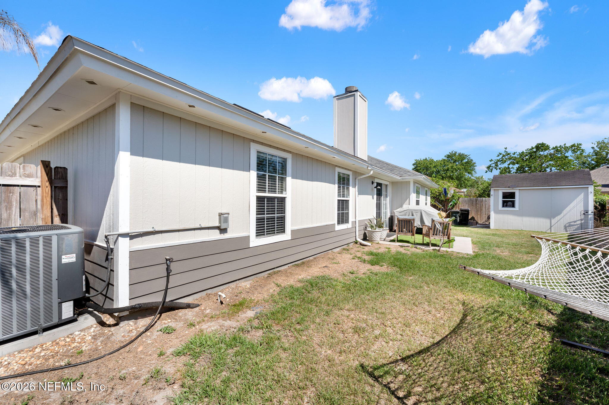 2982 Chief Ridaught Trail Middleburg, FL 32068 - Photo 28 of 29 a view of a house with backyard and sitting area