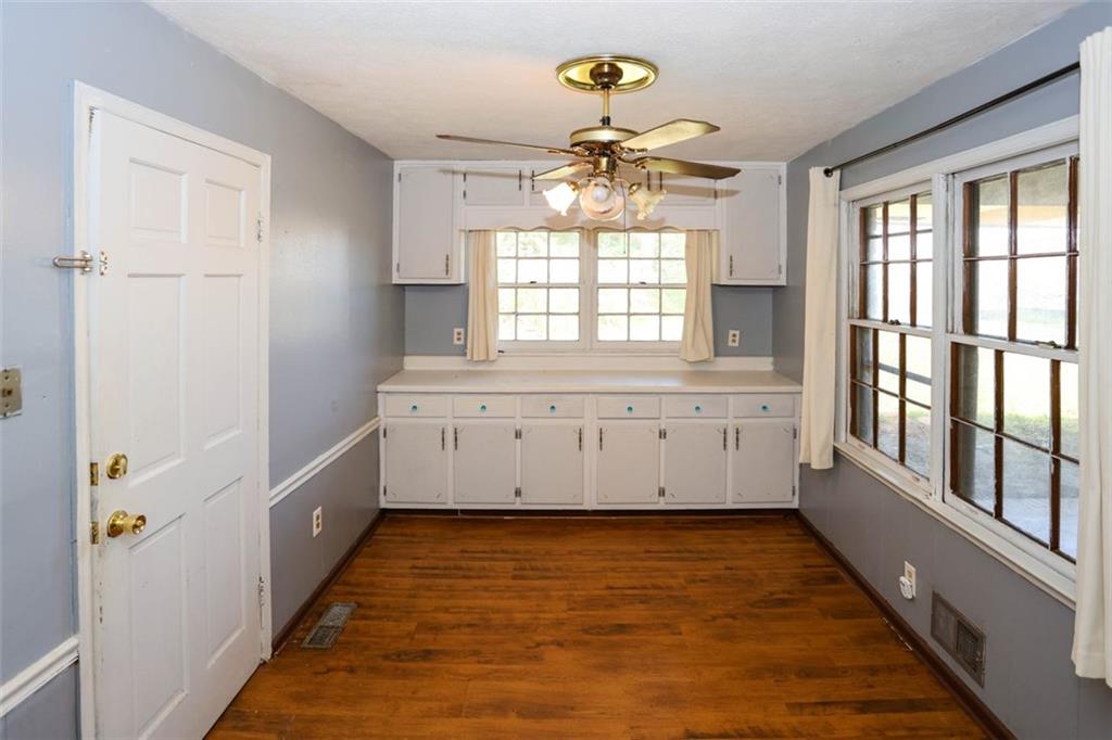 3462 Fairview Road Covington, GA 30016 - Photo 12 of 55 a view of an empty room with a window